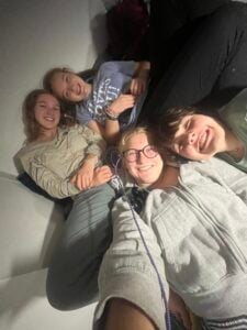 Me, Addison, Marcie, and Heidi spending time together in my bed